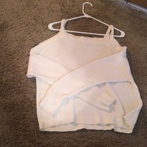 Express sweater with shoulder cut outs.
